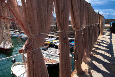 Fishing nets on pier at harbor