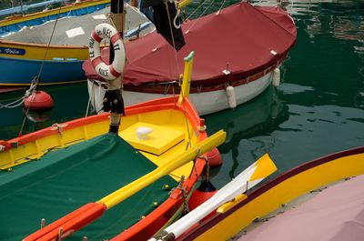 High angle view of boats moored in water