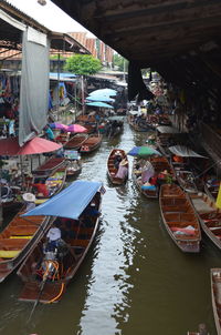 High angle view of boats moored in river