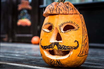 Close-up of jack o lantern on floor