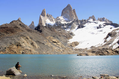 Scenic view of snowcapped mountains against clear blue sky and lake in patagonia argentina 