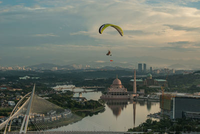 Aerial view of cityscape against sky