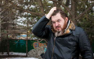 Man standing outdoors during winter