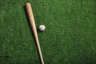 Close-up of golf ball on field