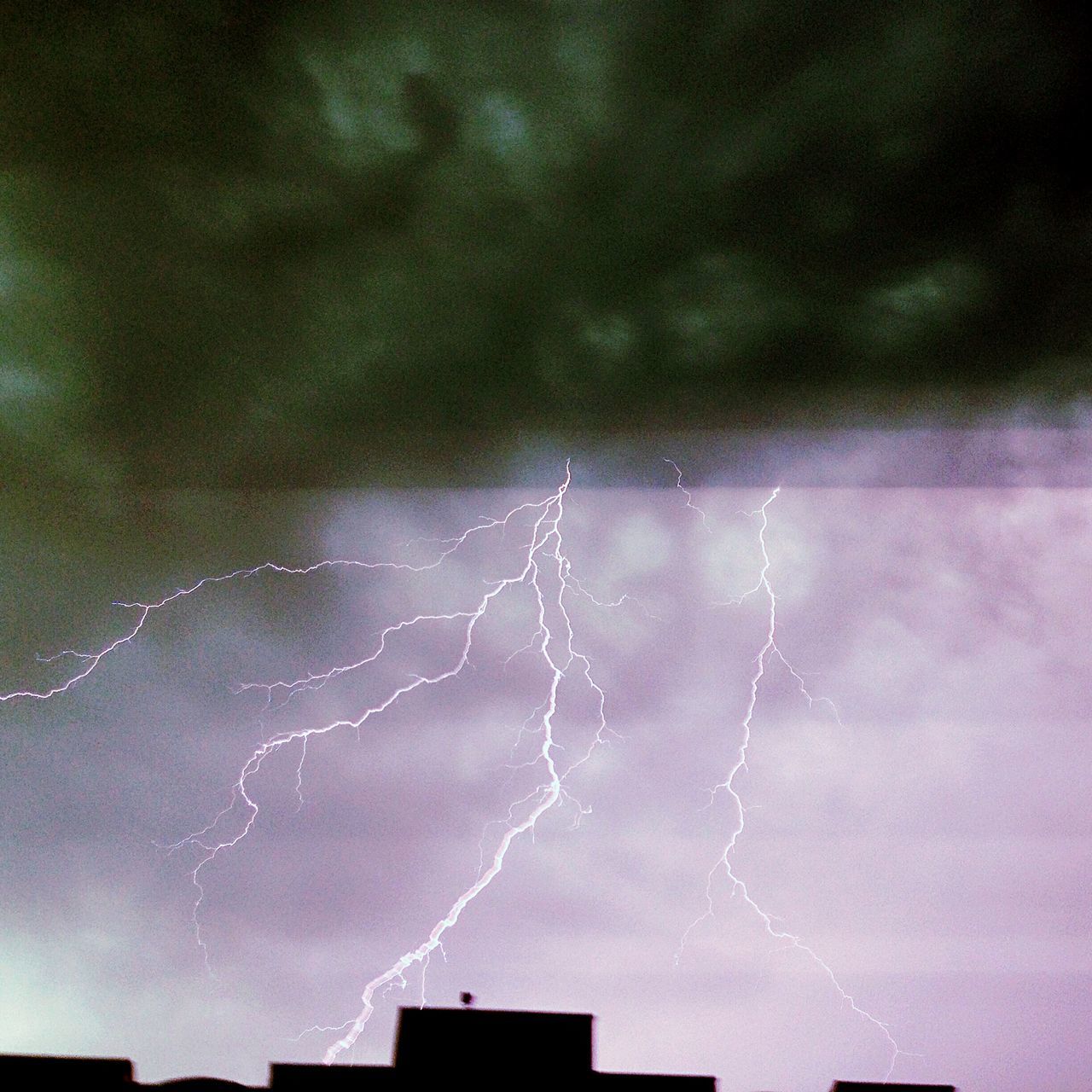 sky, weather, low angle view, building exterior, night, built structure, architecture, storm cloud, power in nature, cloud - sky, lightning, thunderstorm, nature, beauty in nature, cloudy, dusk, storm, outdoors, house, illuminated