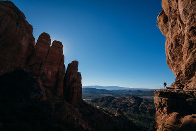 Scenic view of rock formations against sky