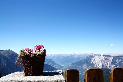 Scenic view of mountains against clear blue sky