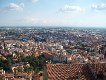 Aerial view of cityscape against sky