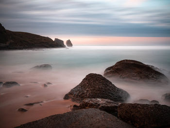 Scenic view of sea against sky during sunset