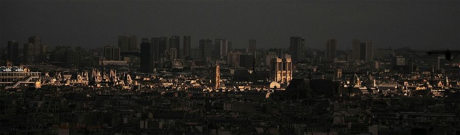 Illuminated cityscape at night