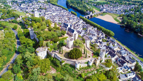 High angle view of houses and river in town