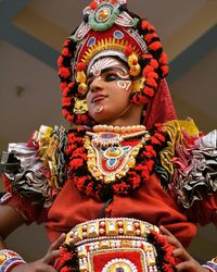 Portrait of young woman looking away