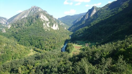 Panoramic view of landscape and mountains against sky