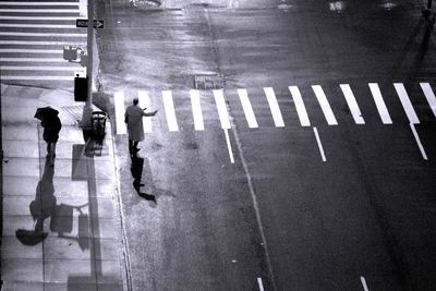 High angle view of people on street at night