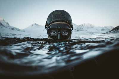 Portrait of man swimming in water