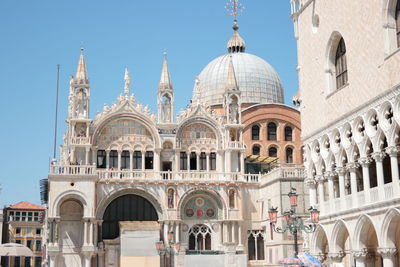 Low angle view of buildings against clear sky