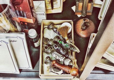 High angle view of paintbrushes on table