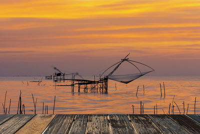 Silhouette of fishing of life along the rakpra place, phatthalung province, south of thailand.