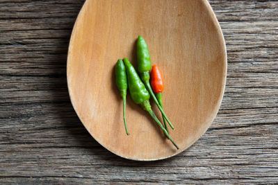 High angle view of chili peppers on table