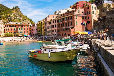 Boats moored at waterfront