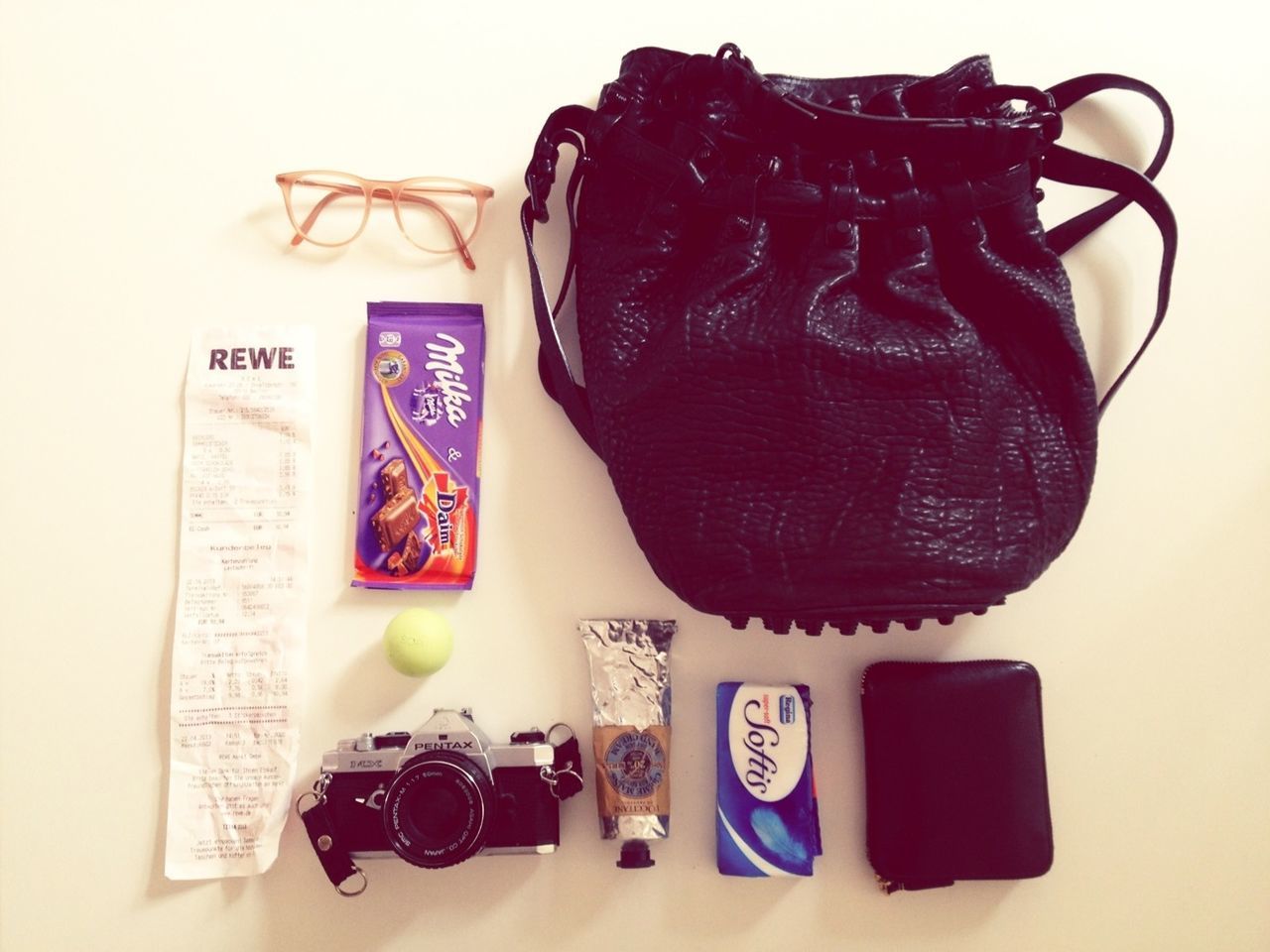 indoors, still life, text, white background, studio shot, western script, close-up, table, communication, high angle view, creativity, art and craft, food and drink, paper, variation, book, auto post production filter, no people, food, sweet food