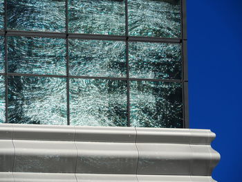 Building seen through glass window