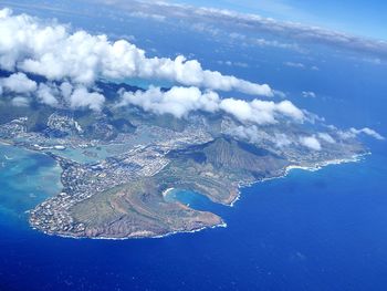 Aerial view of landscape and sea against sky