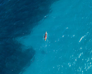 High angle view of person swimming in sea