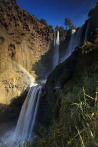 Low angle view of waterfall