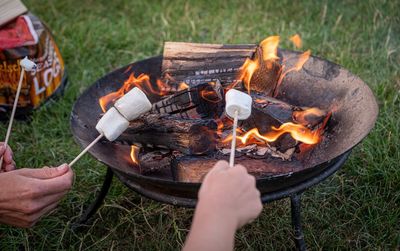 High angle view of preparing food on barbecue grill