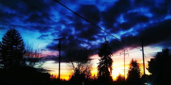 Low angle view of cloudy sky at sunset