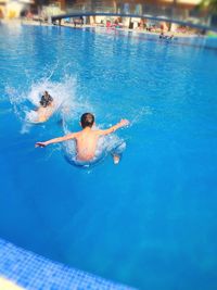 High angle view of diving in swimming pool