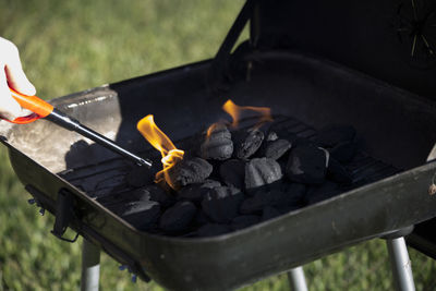 High angle view of meat on barbecue grill