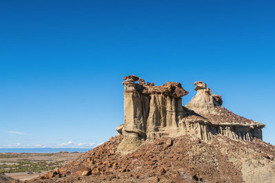 Bisti badlands landscape of grey hoodoos or rock formations in the desert of new mexico