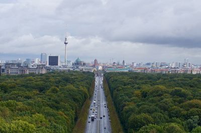 View of city against cloudy sky