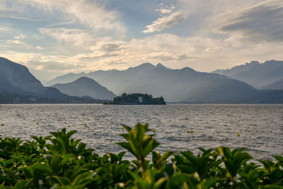 Scenic view of bay against mountains