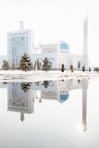 Tashkent, uzbekistan. december 2020. white mosque minor in winter on a sunny day
