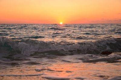 Scenic view of sea against sky during sunset