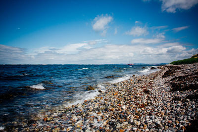 Scenic view of beach against sky