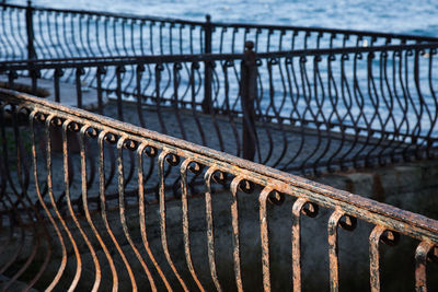 Close-up of pier on bridge over river