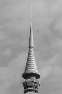 Low angle view of temple against cloudy sky