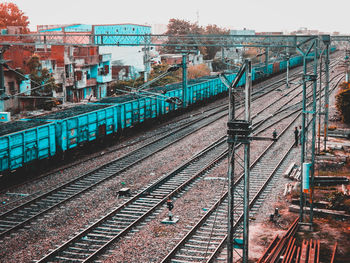 Train at railroad station against clear sky