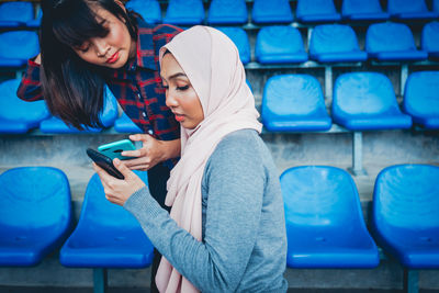 Young woman using mobile phone