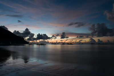 Scenic view of sea against sky at sunset