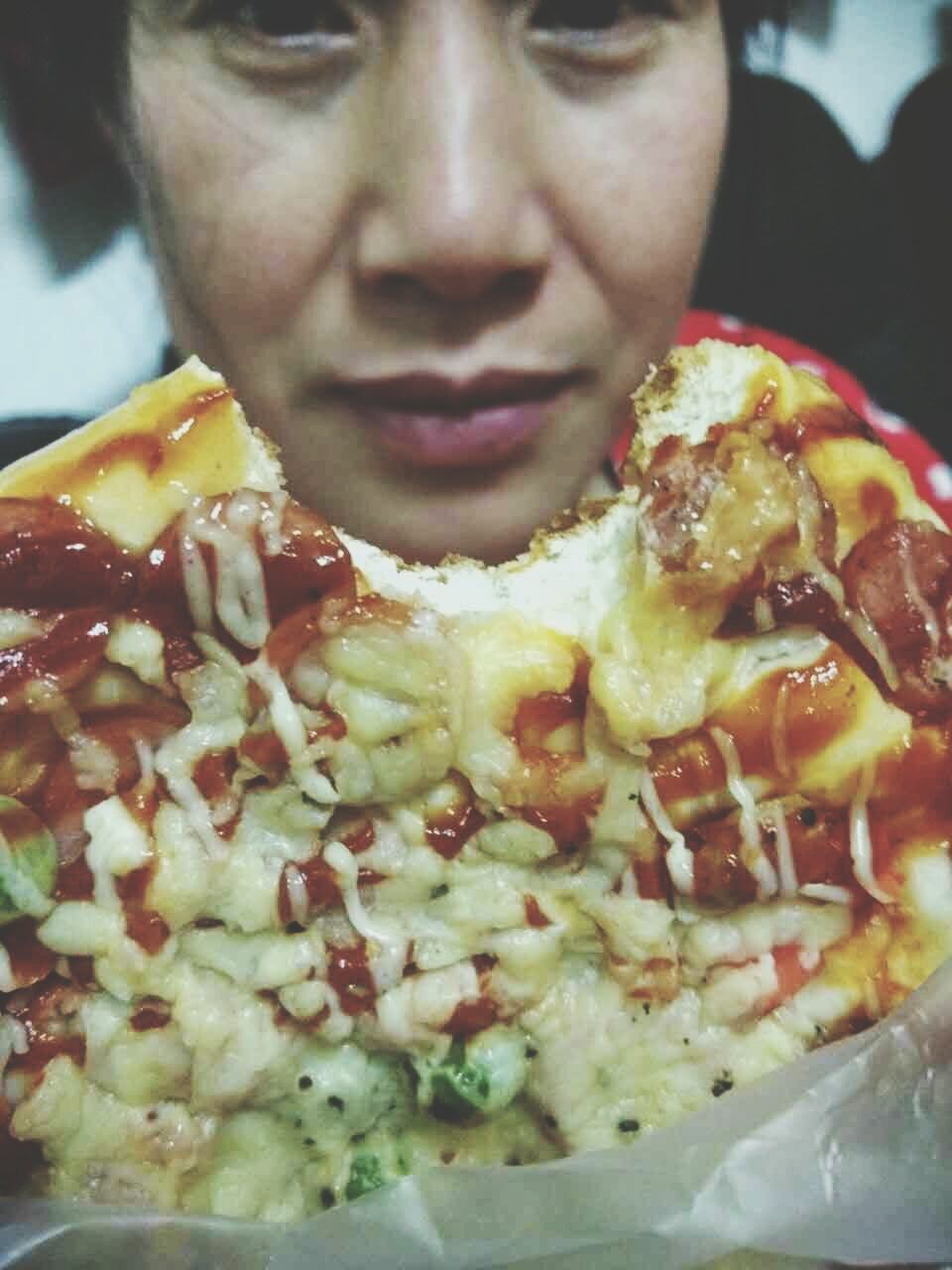 CLOSE-UP OF WOMAN EATING FOOD