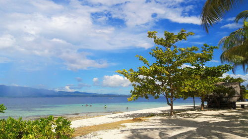 Scenic view of sea against cloudy sky