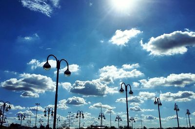 Low angle view of street light against sky