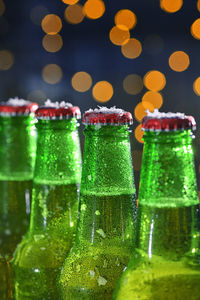 Close-up of wine bottles on table