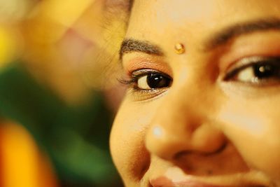 Close-up portrait of woman with make-up