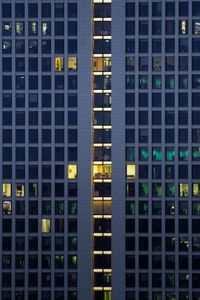 Full frame shot of modern building at night